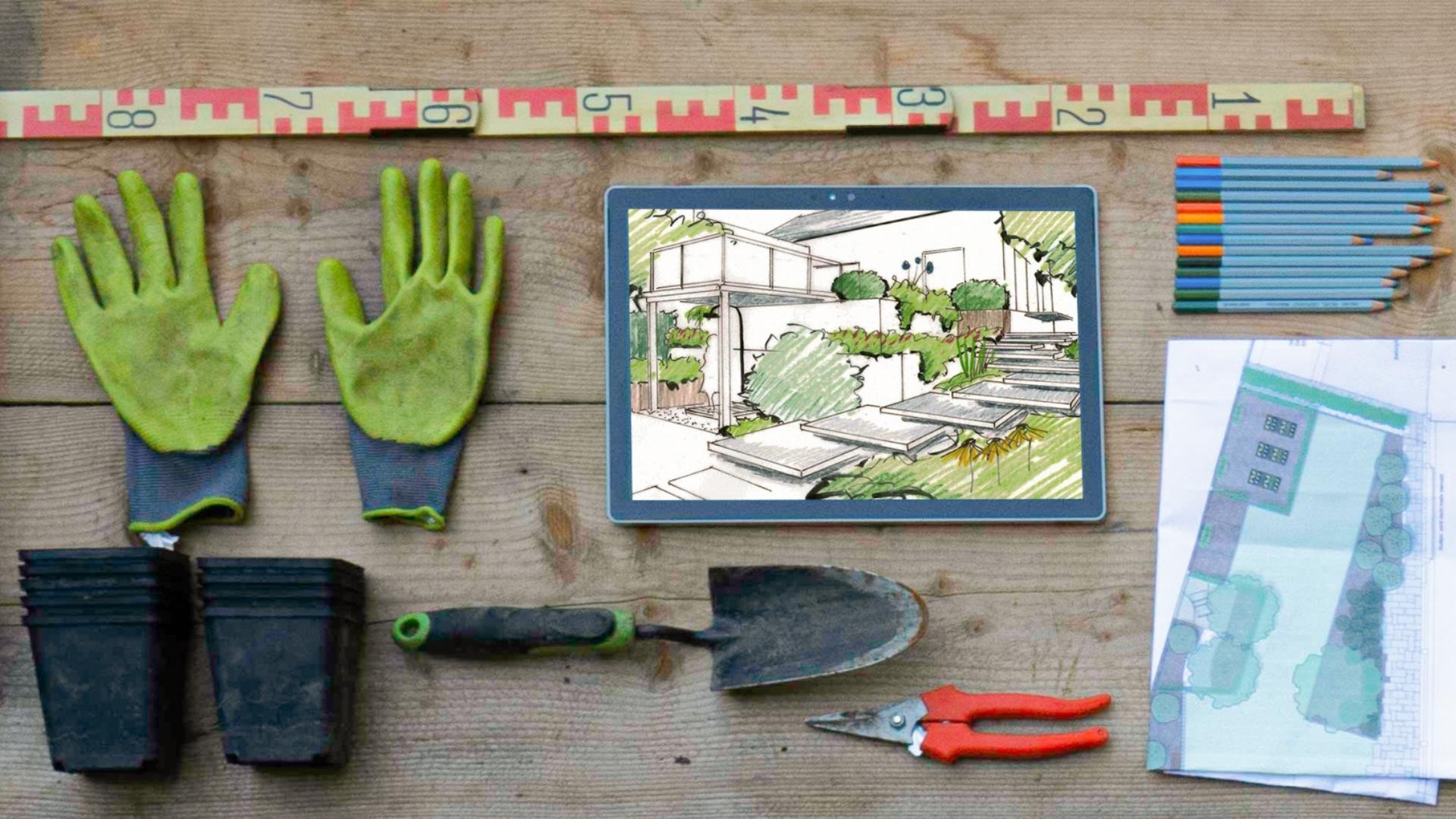 Flatlay mit Handschuhen, Skizze, Schaufel und Plan – Garten selber planen in 7 Schritten